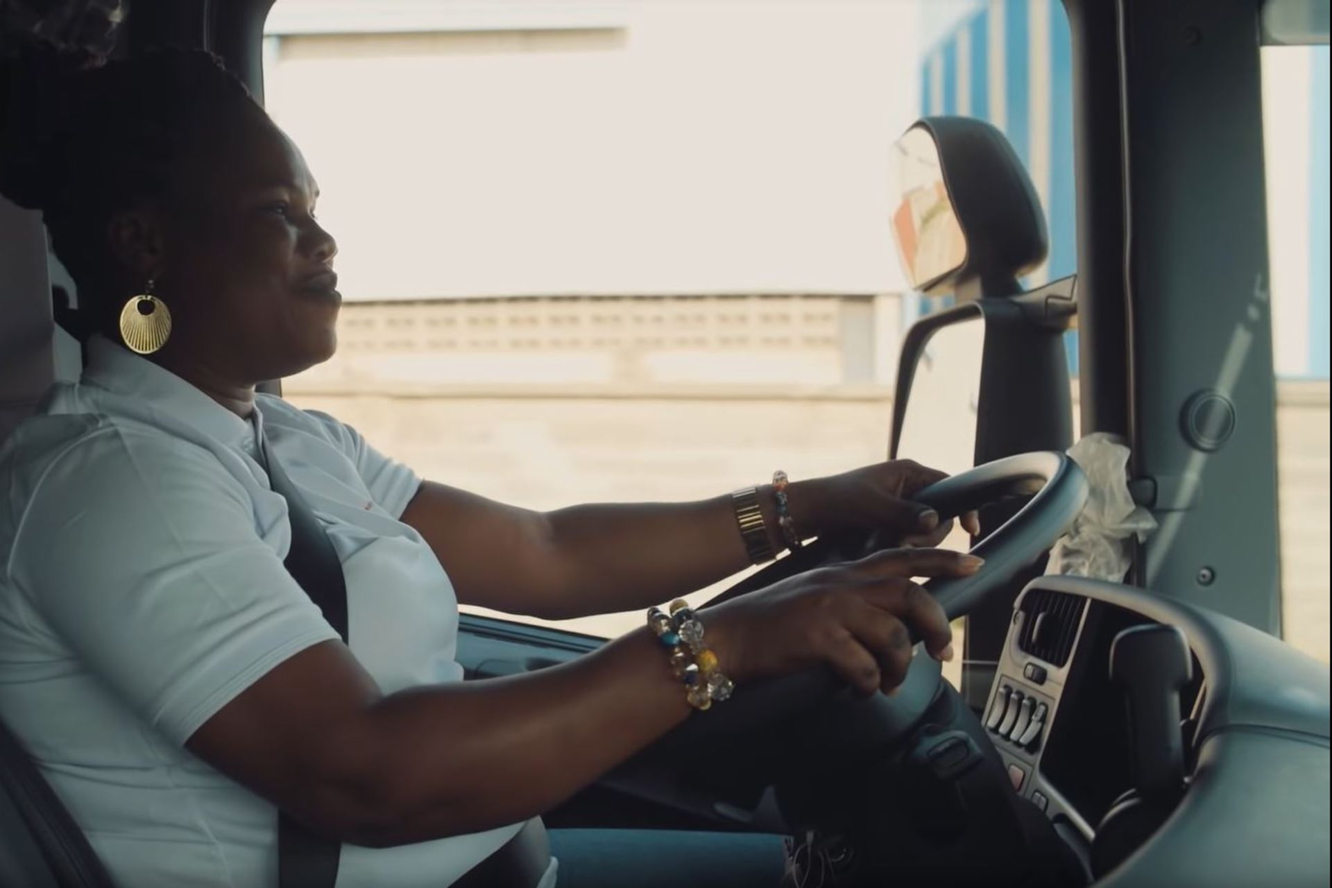 Woman in Accra driving a train