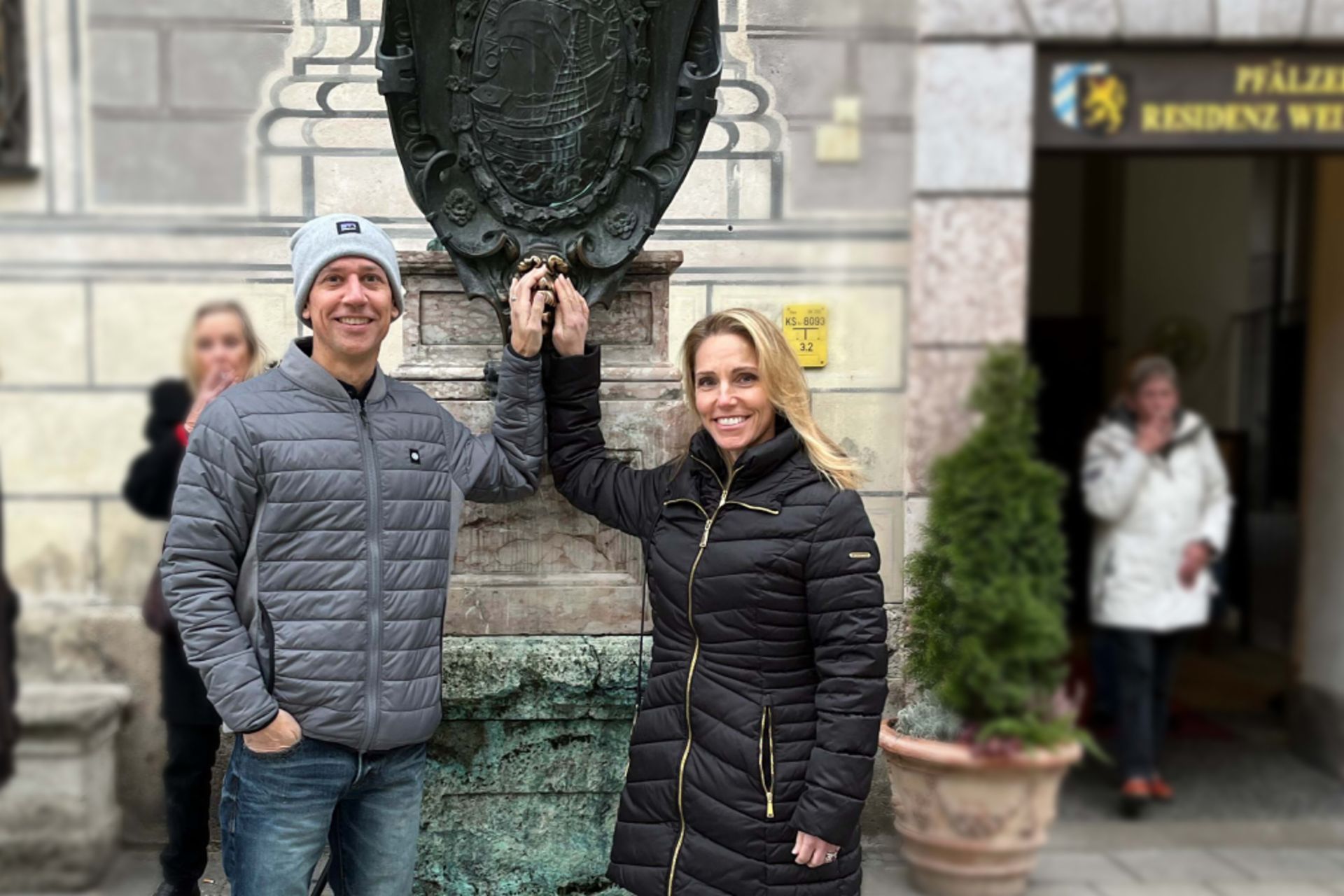 Historical tour of Munich: Darcy and Matthew in front of the Residenz on Odeonsplatz during a city tour.